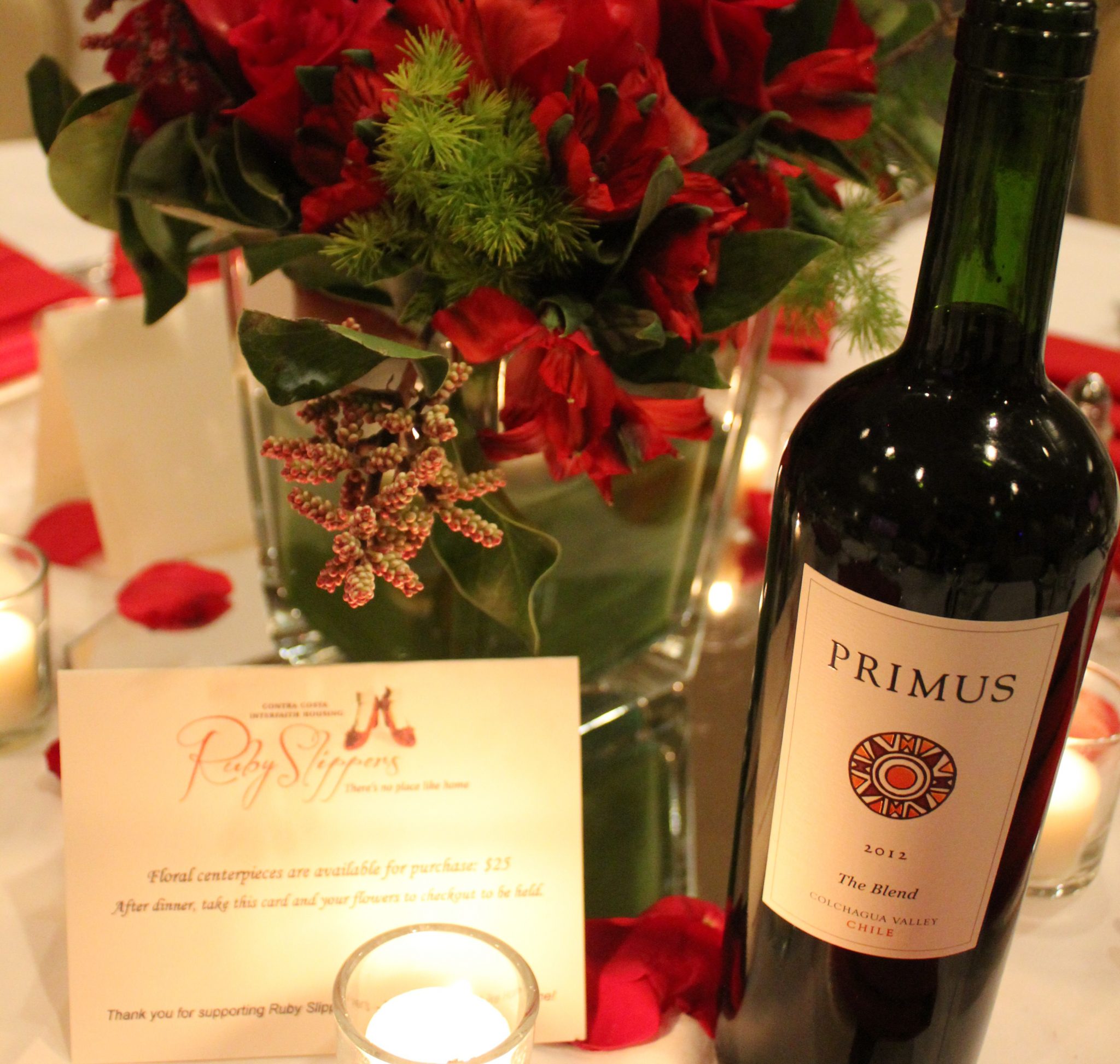 Wine bottle and placeholder on table